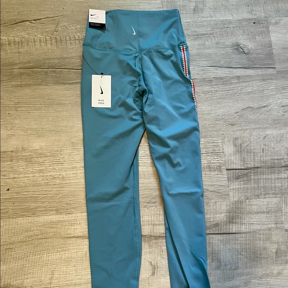 Nike Pants - womans nike Dri-fit yoga crochet-edge 7/8 leggings. small. light blue. NWT